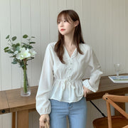 Redefine elegance with the Shintimes V-Neck White Blouse with Sashes.
