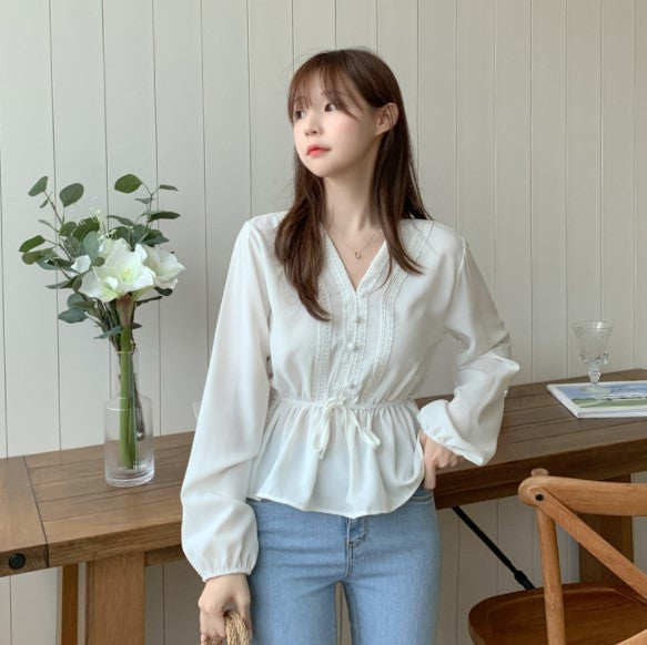 Redefine elegance with the Shintimes V-Neck White Blouse with Sashes.