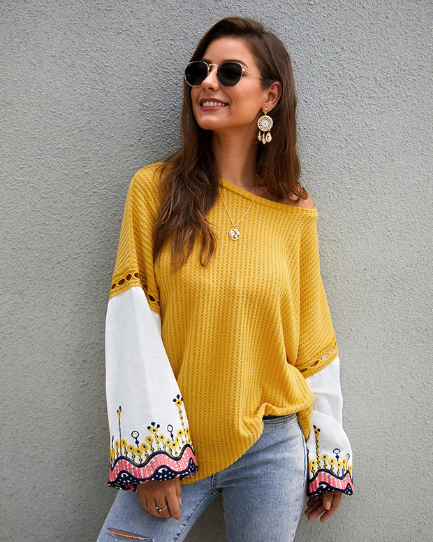Model wearing the sweater with casual jeans