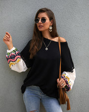 Front view of the cozy knit sweater in neutral color