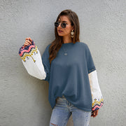 Model wearing the sweater with casual jeans