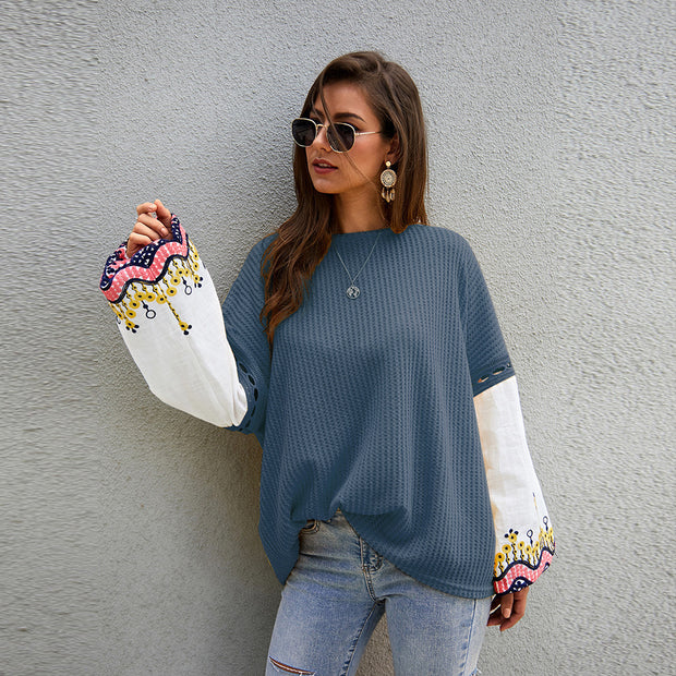 Model wearing the sweater with casual jeans